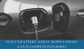 Electric vehicle production line in Italy showing automated machinery and battery assembly within a modern industrial facility